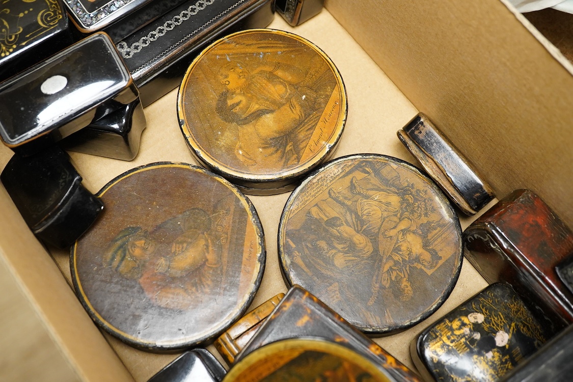 A collection of various snuff boxes to include papier mache examples, two with printed lids and some inlaid examples